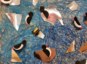 Pingwiny na lodowych taflach.